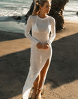 The Shea Long Sleeve T-Shirt Dress in White — front view of the crew neck bamboo maxi dress at golden hour