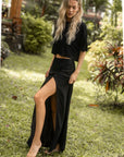 The Travel T in black styled with a black maxi skirt